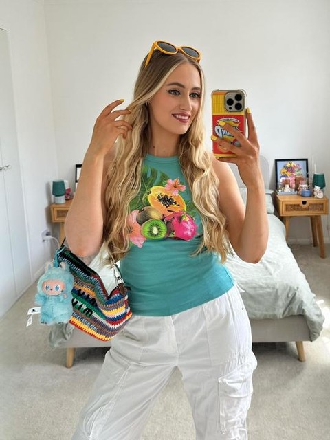 ASOS DESIGN racer tank vest with tropical fruit graphic in turquiose