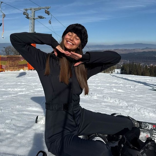 4505 Ski belted ski suit with skinny leg and hood in black 