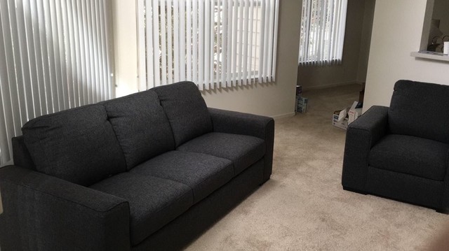 Lucy Dark Grey Loveseat Living Spaces